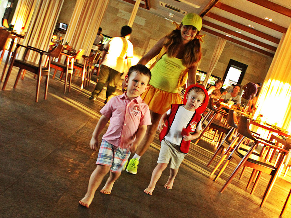 A lady with her two boys visiting Cuca Bali restaurant