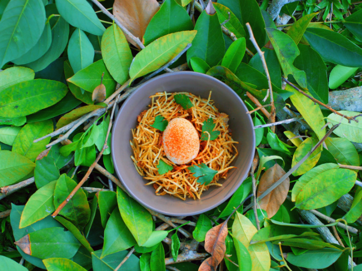 a unique presentation of spciy pulled beef present by Cuca Bali