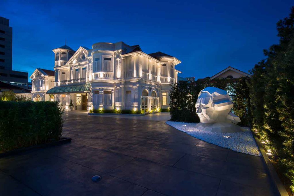 a beautiful white building viewed in the night on Cuca Gastro Tour hits Malaysia!